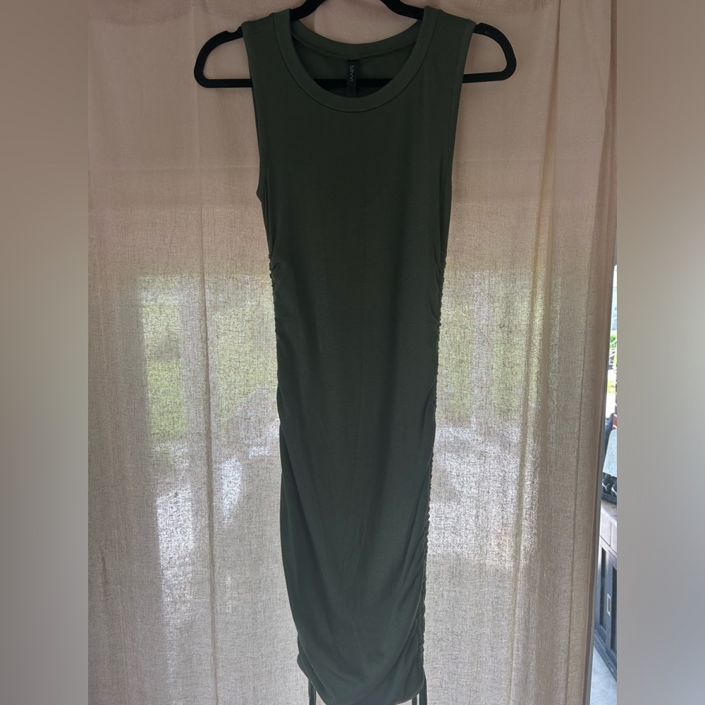 Tight fit Savvi dress. Never been worn. Fits XS - Small.